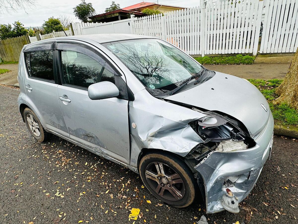 Damaged Daihatsu Sirion bought for cash in South Auckland