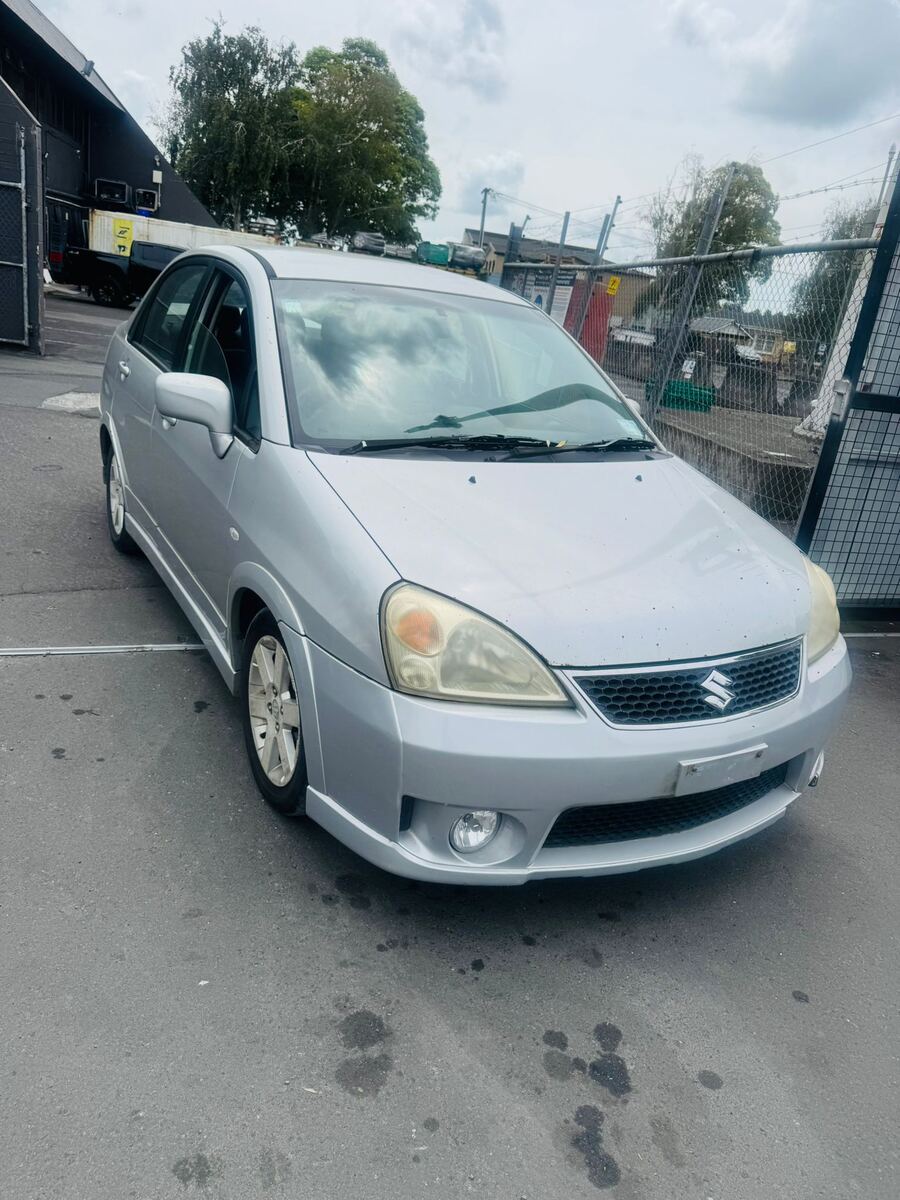 Silver Suzuki Liana scrap car valued and collected in South Auckland